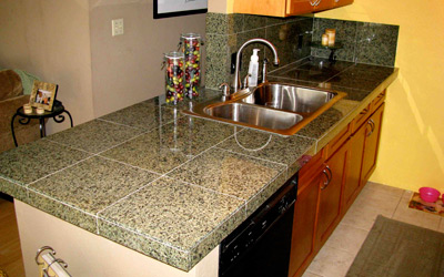 Professional granite countertop fabricators use colored epoxies